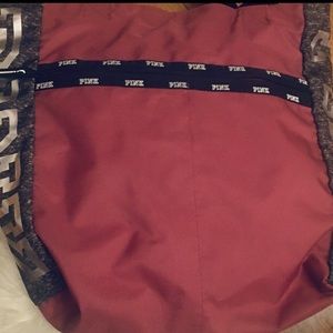 Pink tote bags and also includes a small pouch